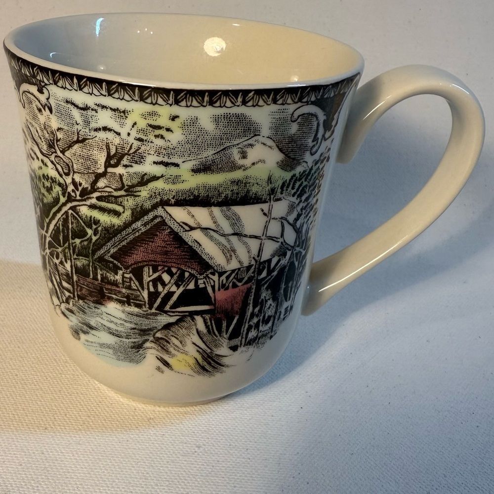 Johnson Brothers "Friendly Village" coffee mug featuring the "Covered Bridge